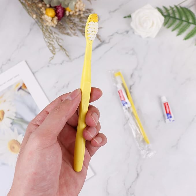 Disposable Toothbrushes with Toothpaste,50 Pack Yellow Hollow Individually Wrapped Disposable Travel Toothbrushes Kit in Bulk for Homeless,Nursing Home,Hotel,Charity